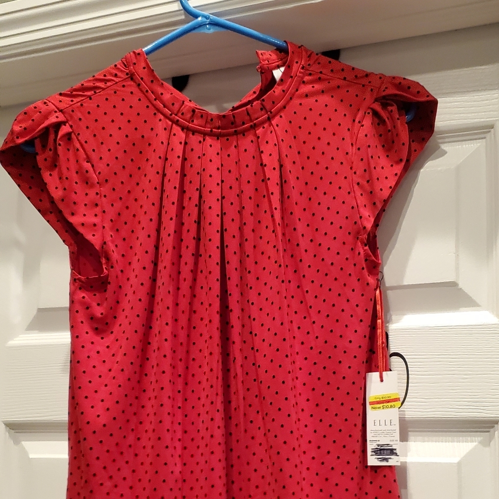 Red shirt with black dots